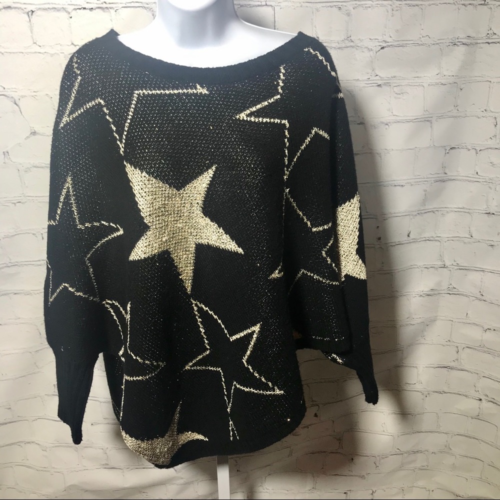 Poncho Style Sweater, Medium. Black and Gold stars